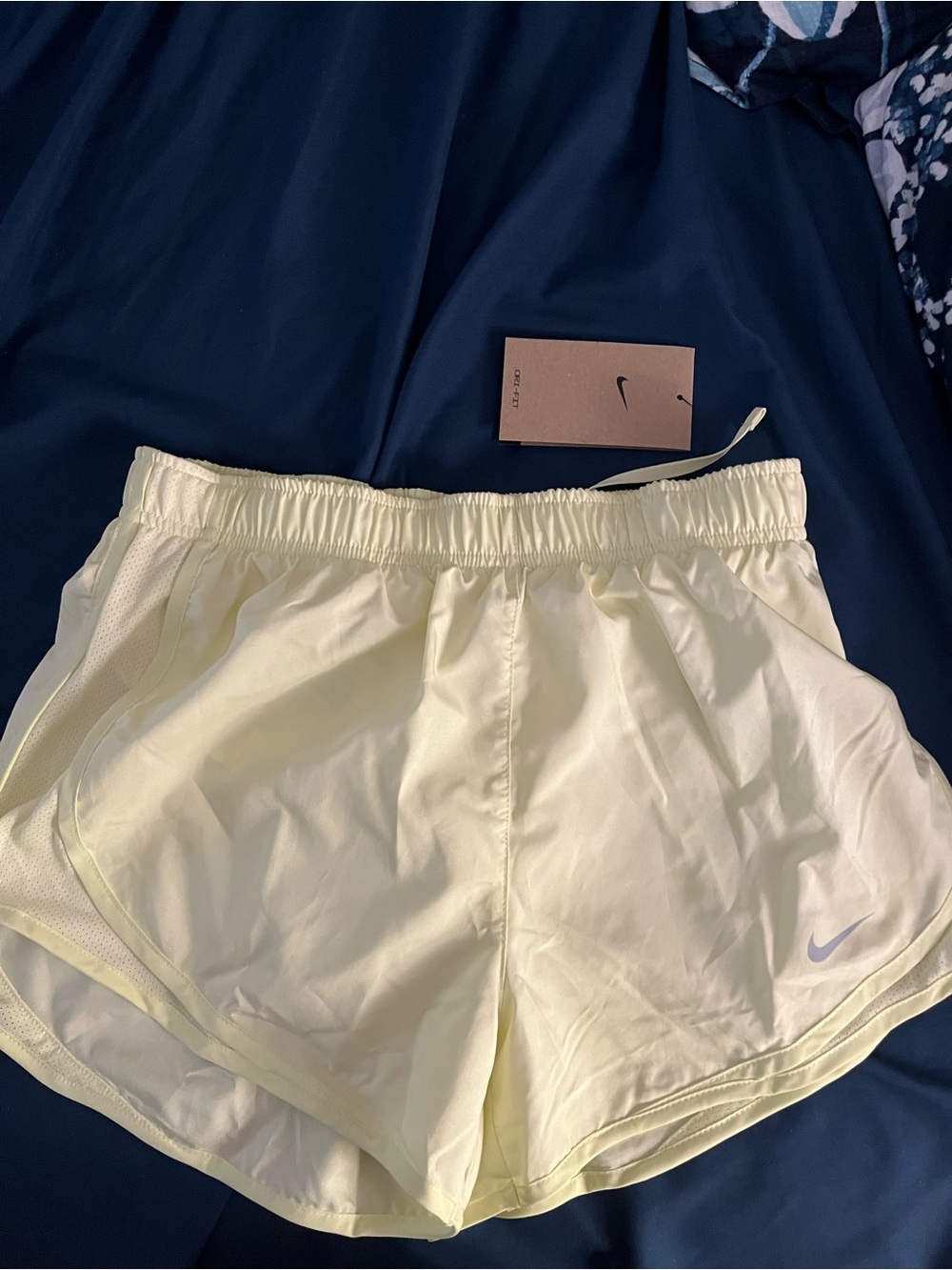 Nike Women's Pale Yellow Athletic Shorts